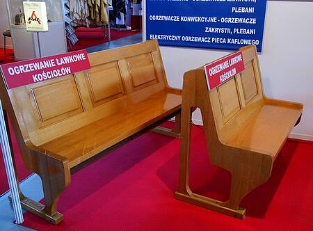 IZOTERMA - the producer of heating system which can be installed in, for example a church pew has been awarded with the honorary prize of HE Kielce Bishop Kazimierz Ryczan