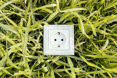 top-view-electric-socket-green-grass.jpg