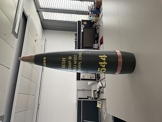 A full-scale (1:1) replica of a 155mm large-caliber ammunition round, produced using additive manufacturing.